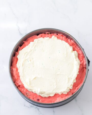 A springform pan with ingredients to make no bake strawberry pie.