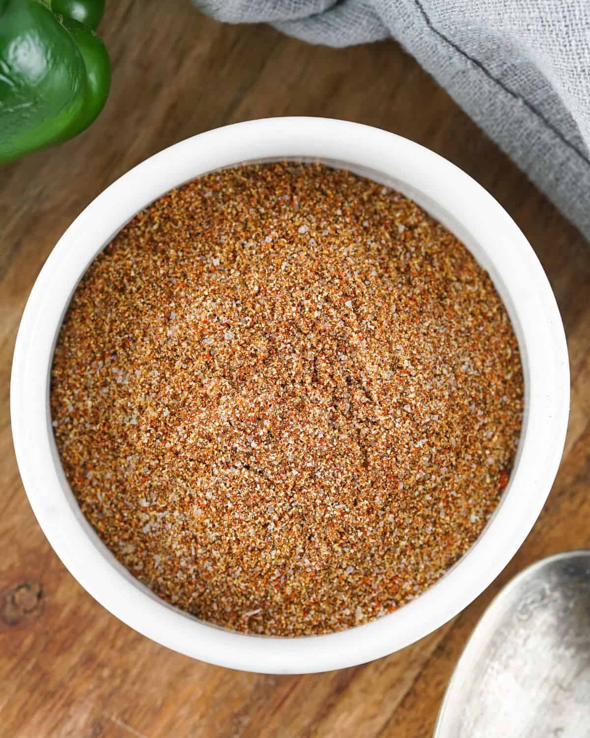 Homemade Fajita Seasoning recipe in a white bowl. 