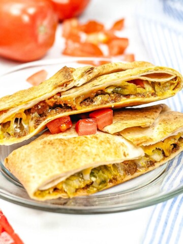 An air fryer copycat crunchwrap supreme in a plate.