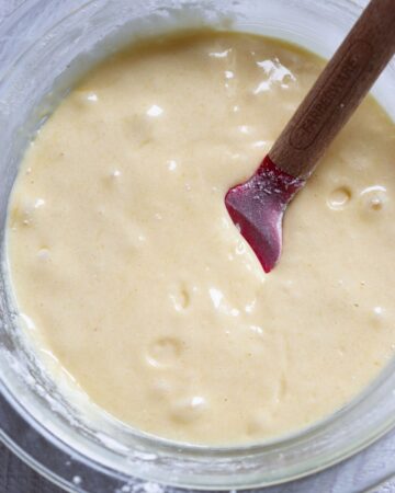A clear mixing bowl with the cake mixture to make an upside down pineapple cake. 