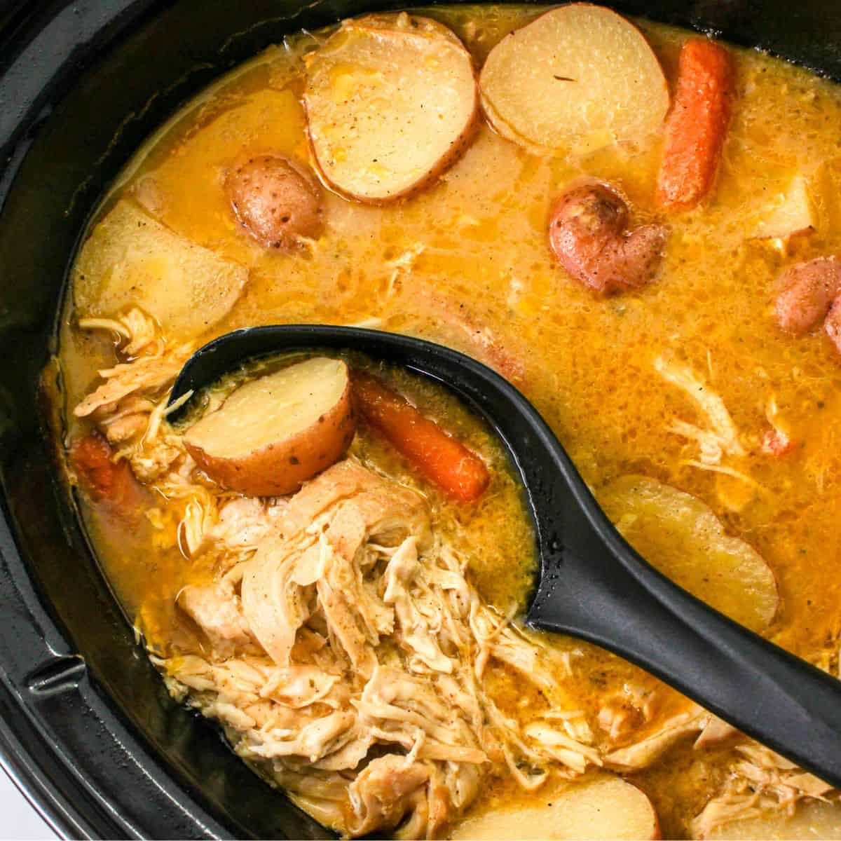 Slow cooker chicken and potatoes with cream of chicken soup.