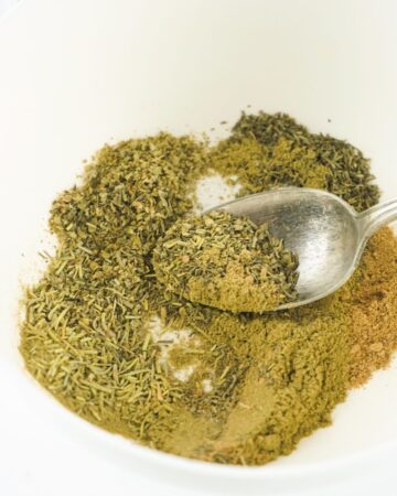 Mixing the spices to make a DIY poultry seasoning.