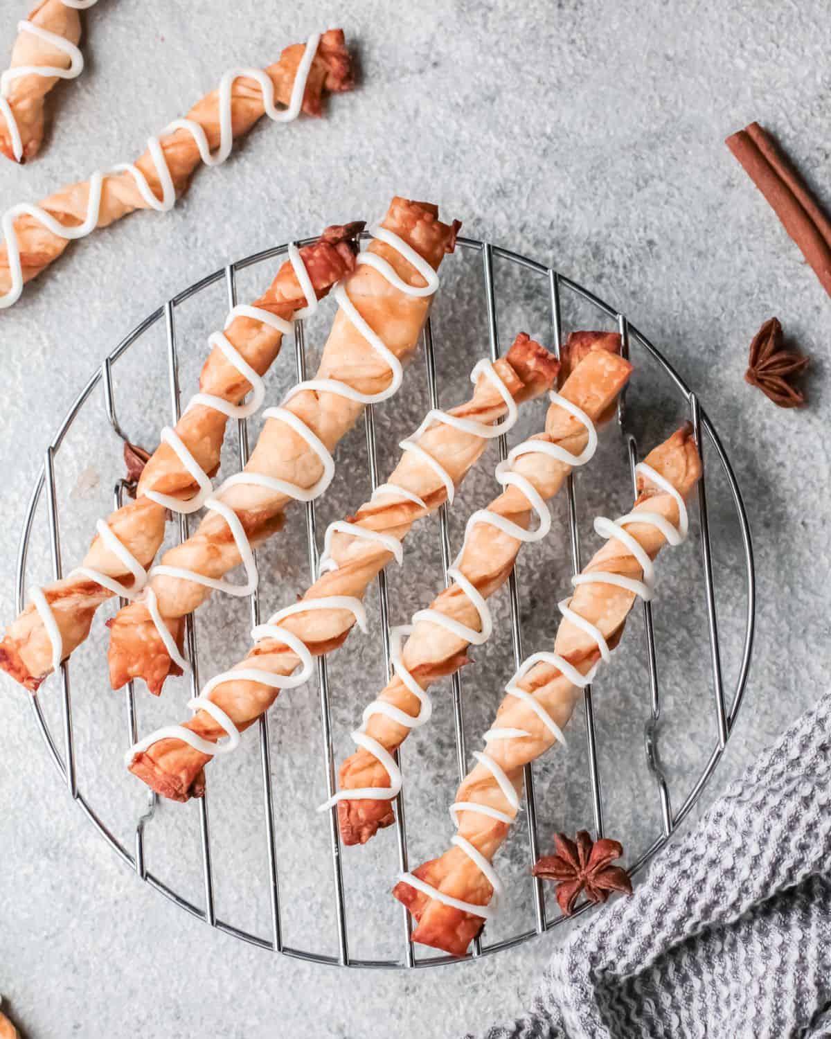 Puff pastry twists filled with shredded apple pie filling.