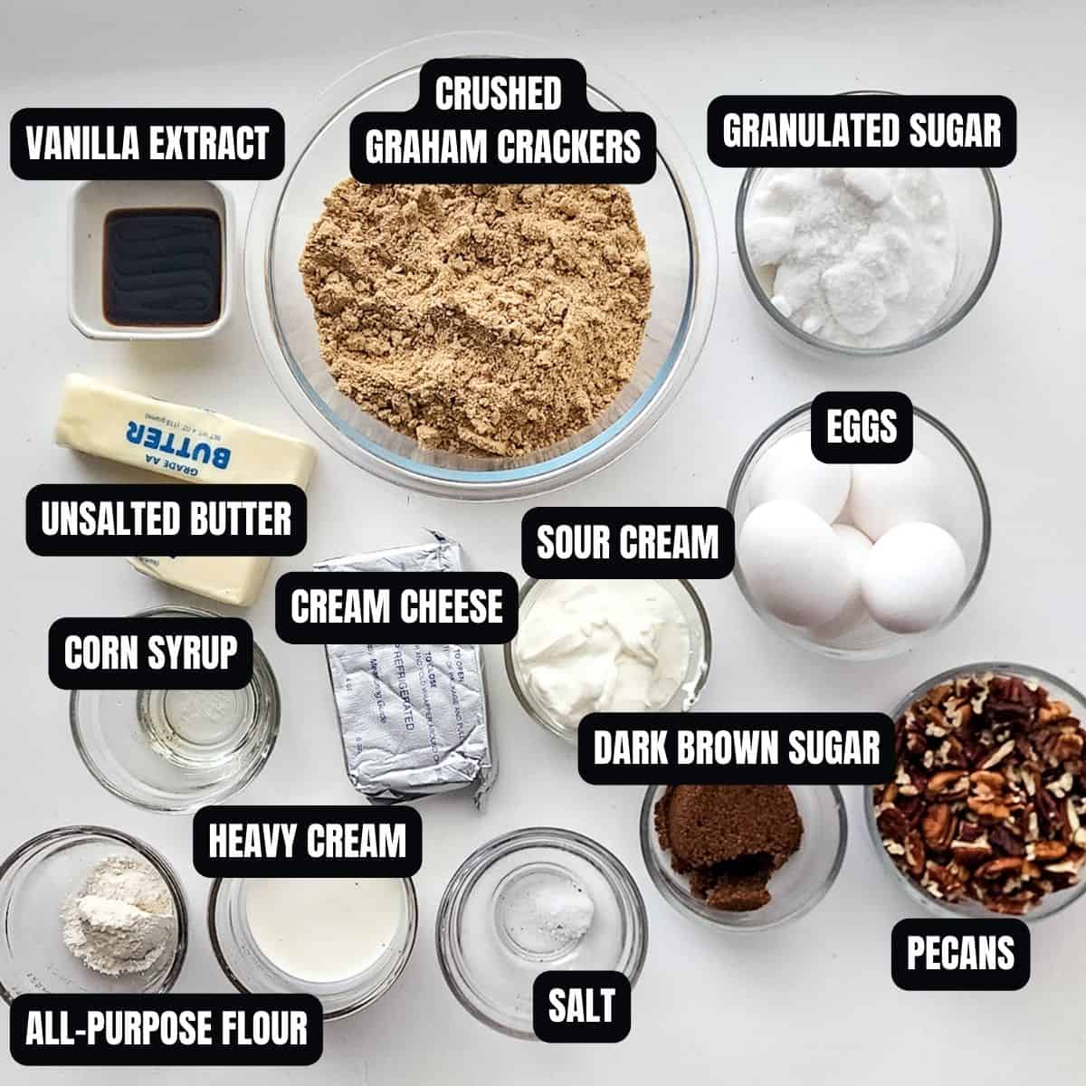 Ingredients to make pecan pie cheesecake recipe with text overlay.