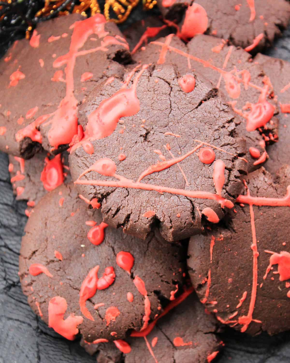 Chocolate Cookies with eatable blood splatter on the cookies.