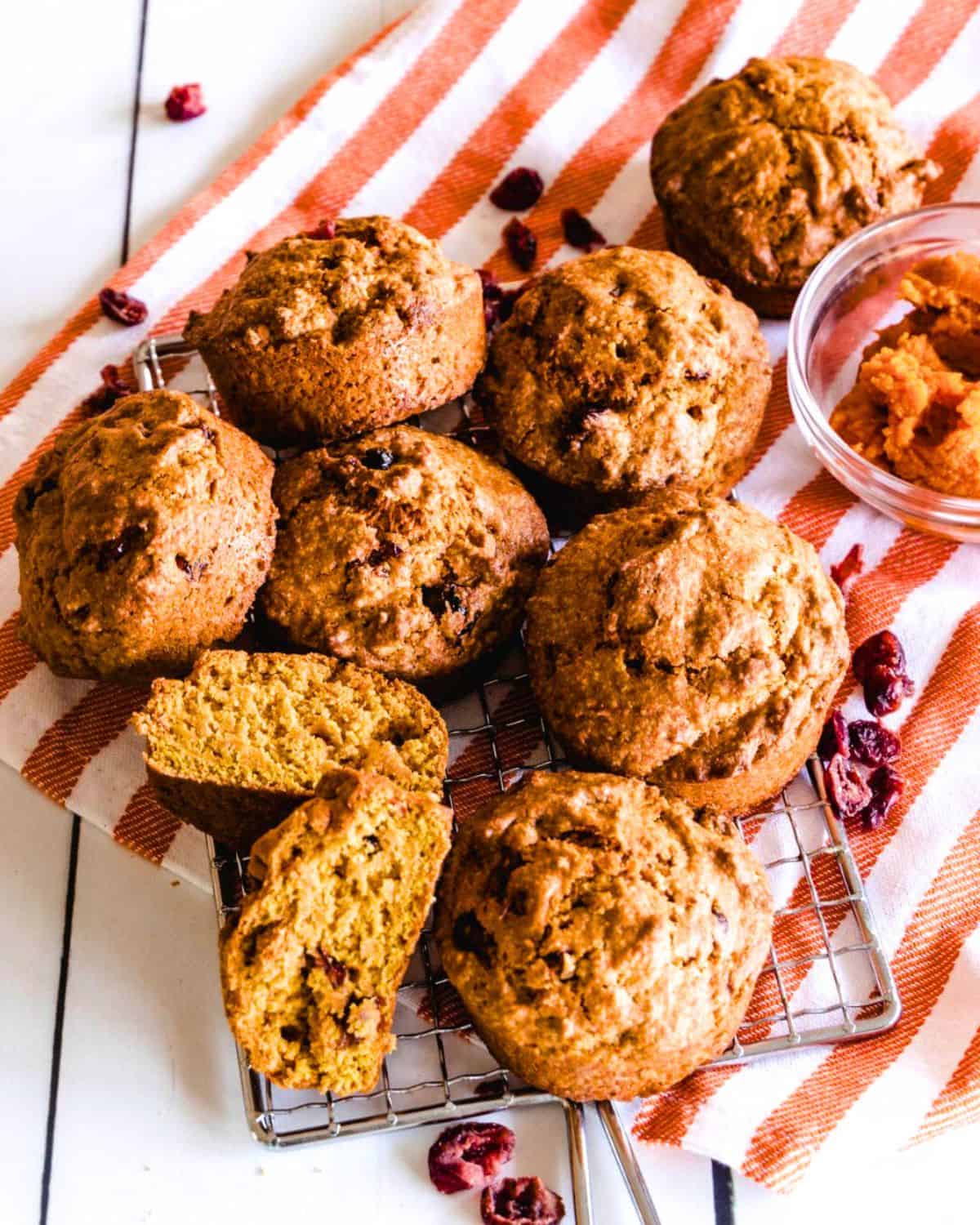 Pumpkin Cranberry Muffins on a linen cloth.