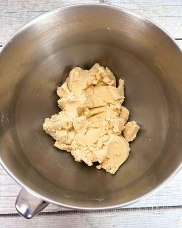 Batter to make lofthouse cookies in a stand mixer bowl.