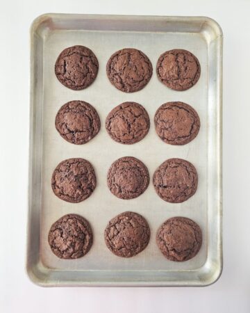 Baked Chocolate cookies on a baking sheet.