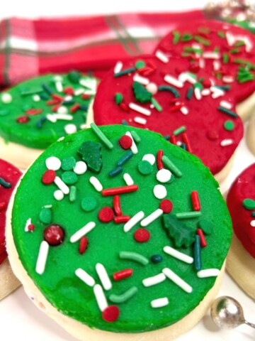 Lofthouse christmas cookies with red and green frosting and sprinkles.