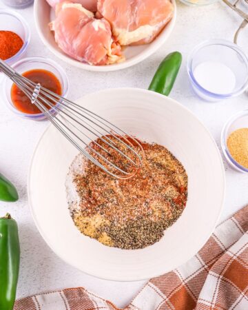 Chicken dry rub ingredients in a small bowl