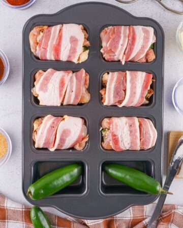 Jalapeno popper stuffed chicken thighs wrapped with bacon.