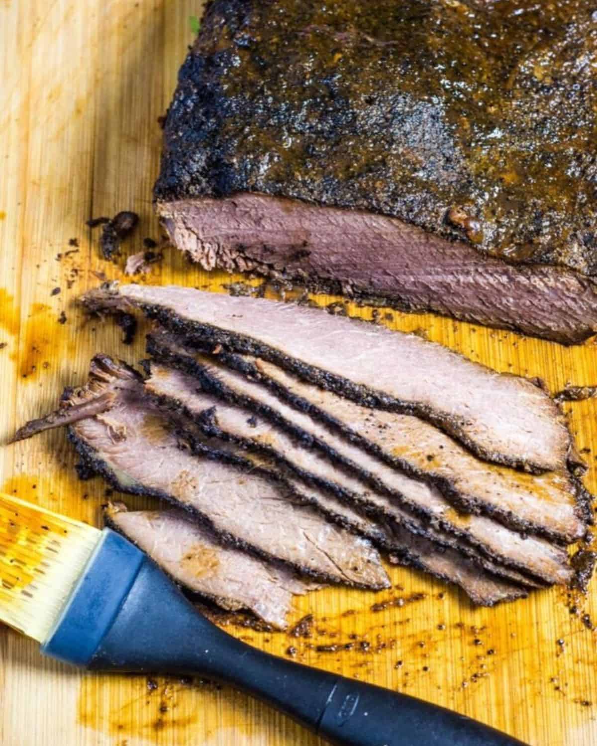 Sliced brisket with a coffee rub made in the slow cooker.