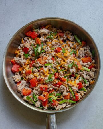 Ground pork, carrots, and peppers to make a teriyaki pork noodle recipe.