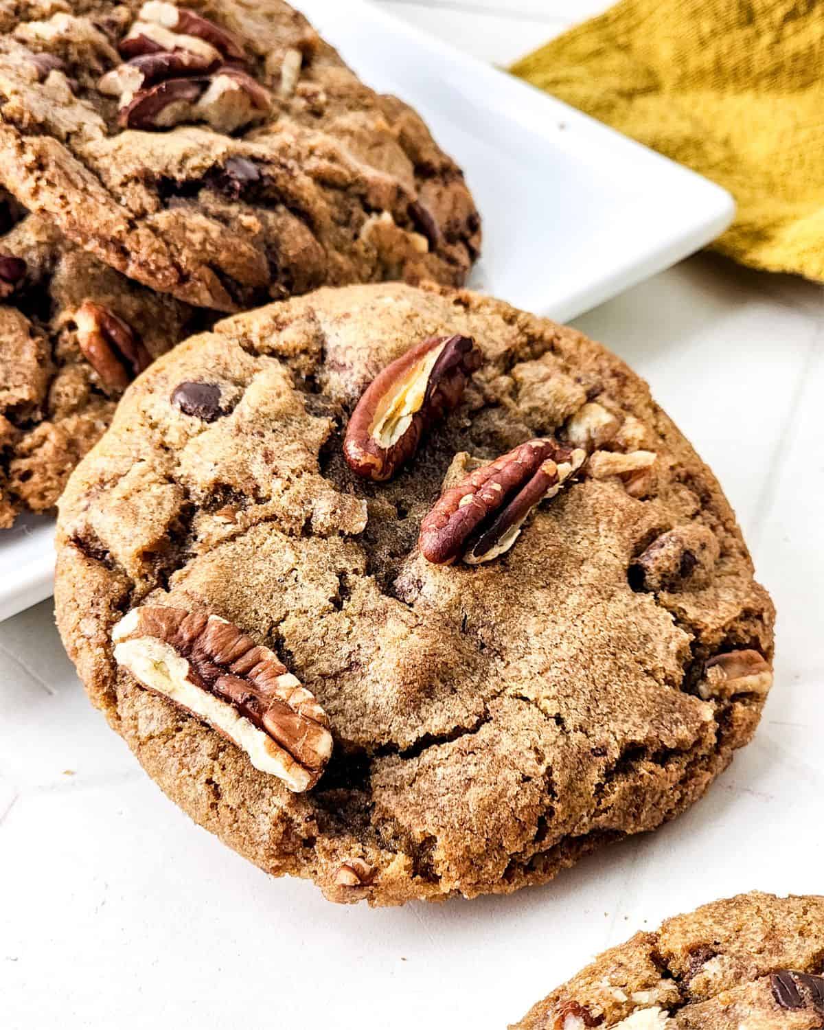 Pecan Brown Butter cookies on a white plate.