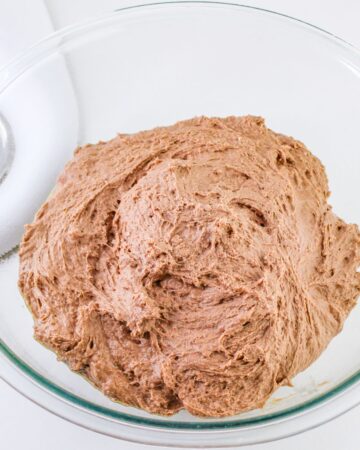 Chocolate flour dough in a bowl to make beignets.