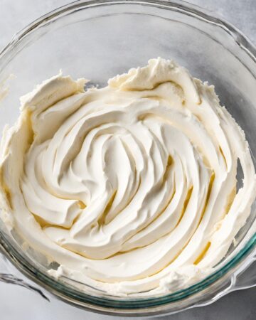 Cream cheese that has been whipped for a Grasshopper mint pie.