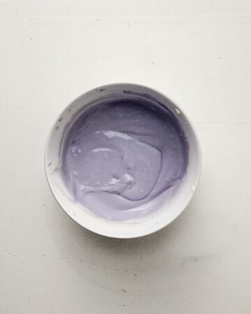 Cheesecake mixture with purple food coloring.