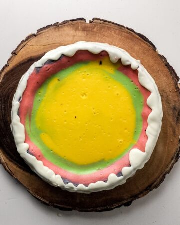 An easter cheesecake that has been baked with pastel colors.