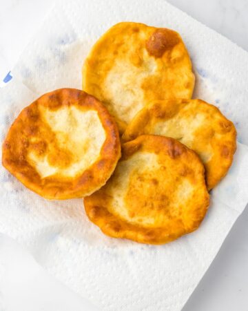 Fry bread taco shells that have been fried.