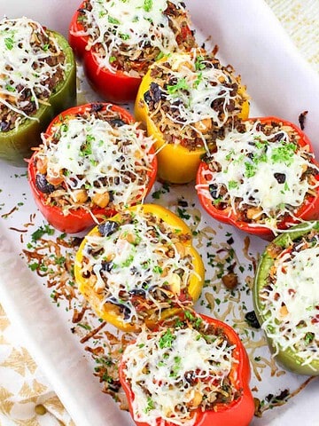 Greek stuffed peppers in a baking dish.