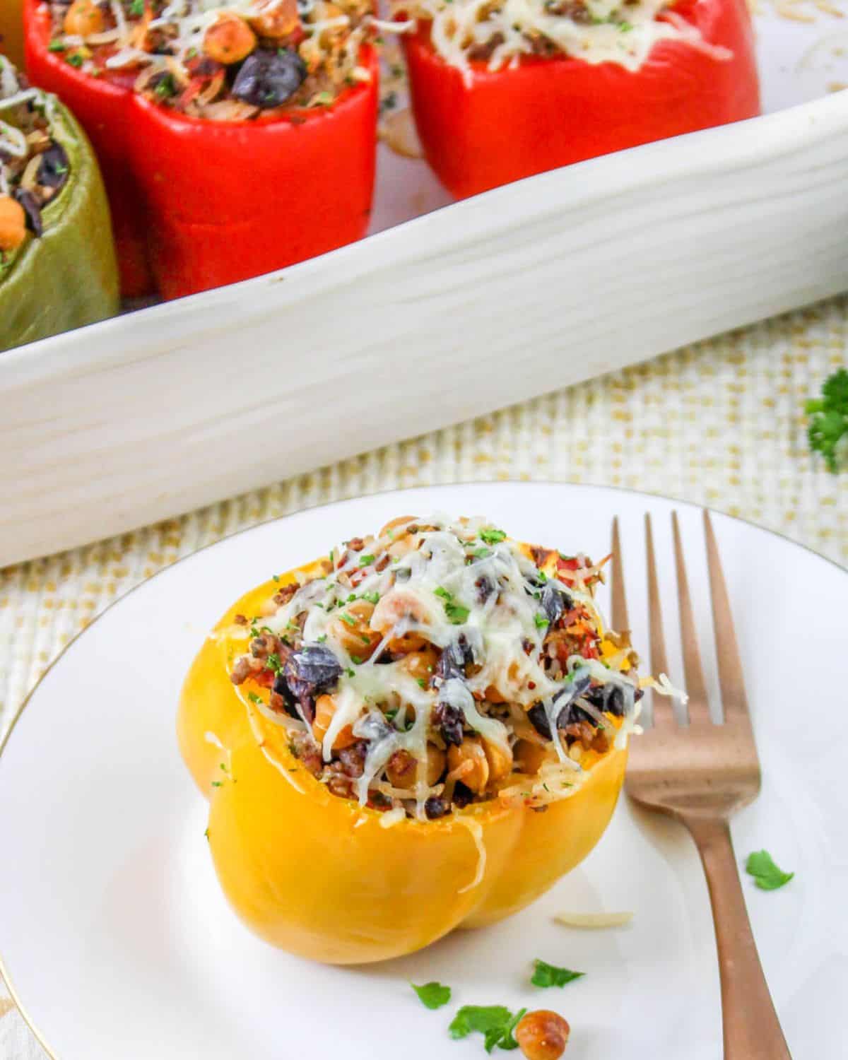 Greek stuffed peppers with chickpeas, rice, and seasoned ground beef. 