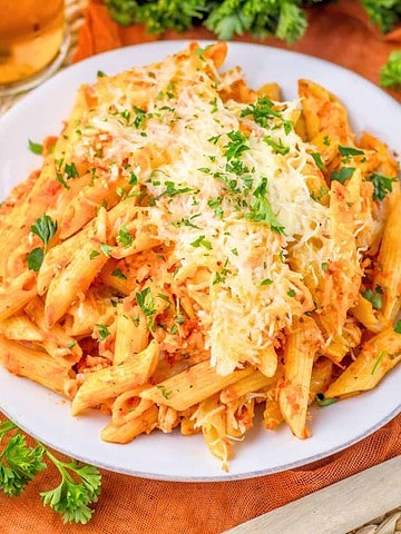 Chicken Parm Casserole plated and topped with chopped fresh parsley.