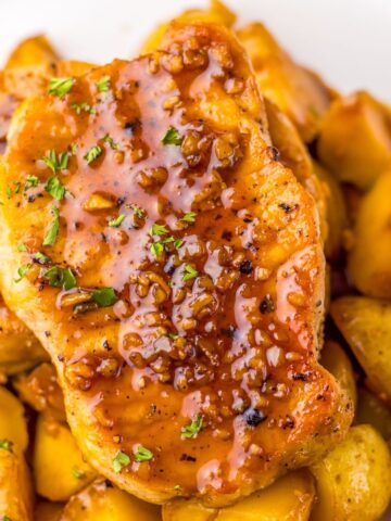 Honey garlic pork chops with yellow potatoes.