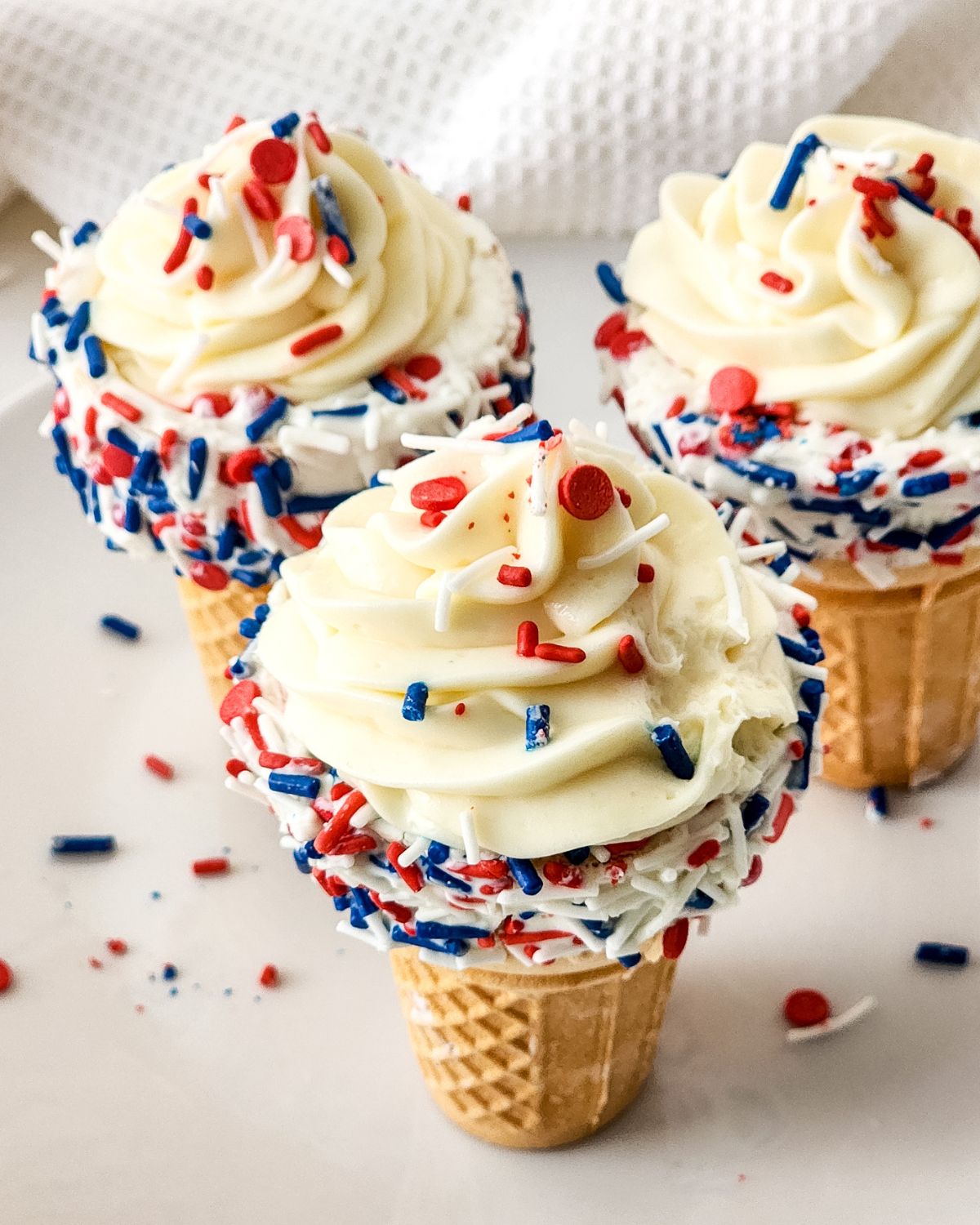 Patriotic cheesecake stuffed ice cream cones with cheesecake filing. 