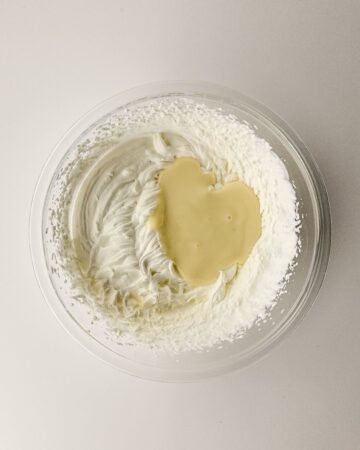 Heavy cream whipped and the sweetened condensed milk into the whipped cream. 