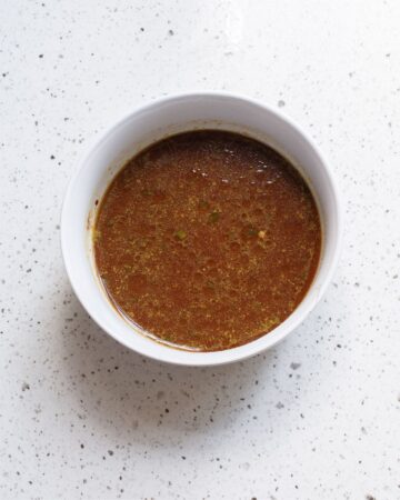 A bowl with ingredients to make a sauce for pork chop suey. 