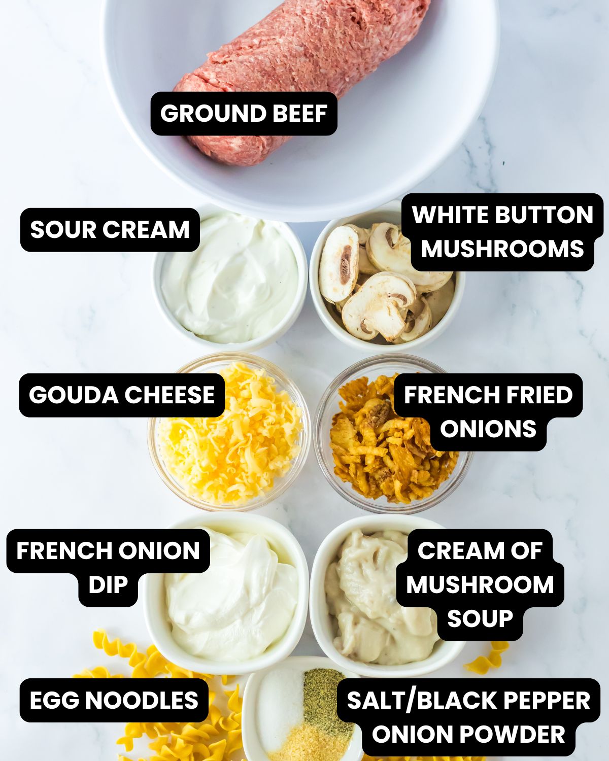 Ingredients for french onion beef casserole with text overlay.