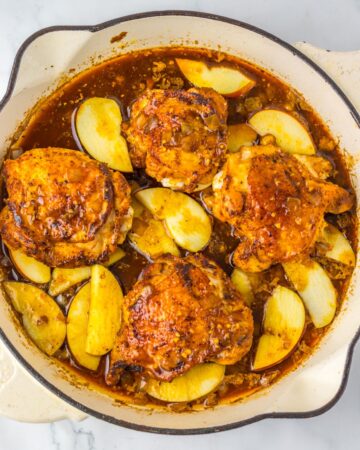 Chicken thighs and apples braised in an apple cider sauce. 