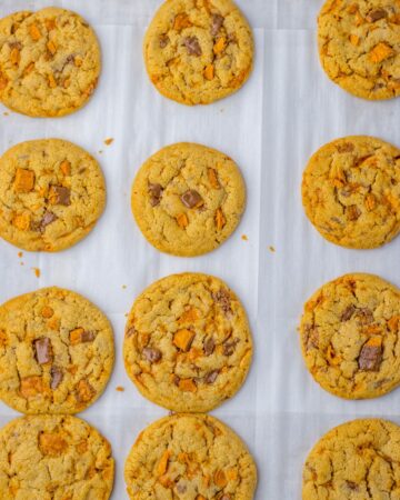 Homemade butterfinger cookies on a tray. 