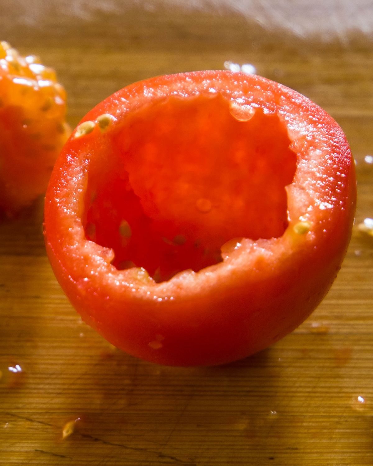 A seeded roma tomato to make pico de gallo recipe. 