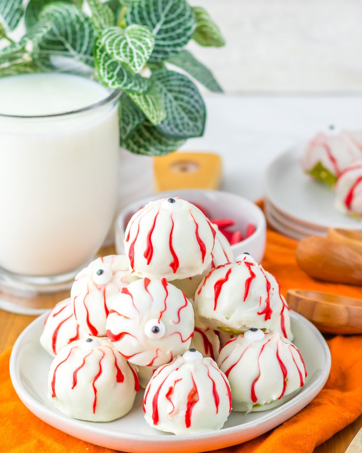 Halloween eyeball truffles on a plate.