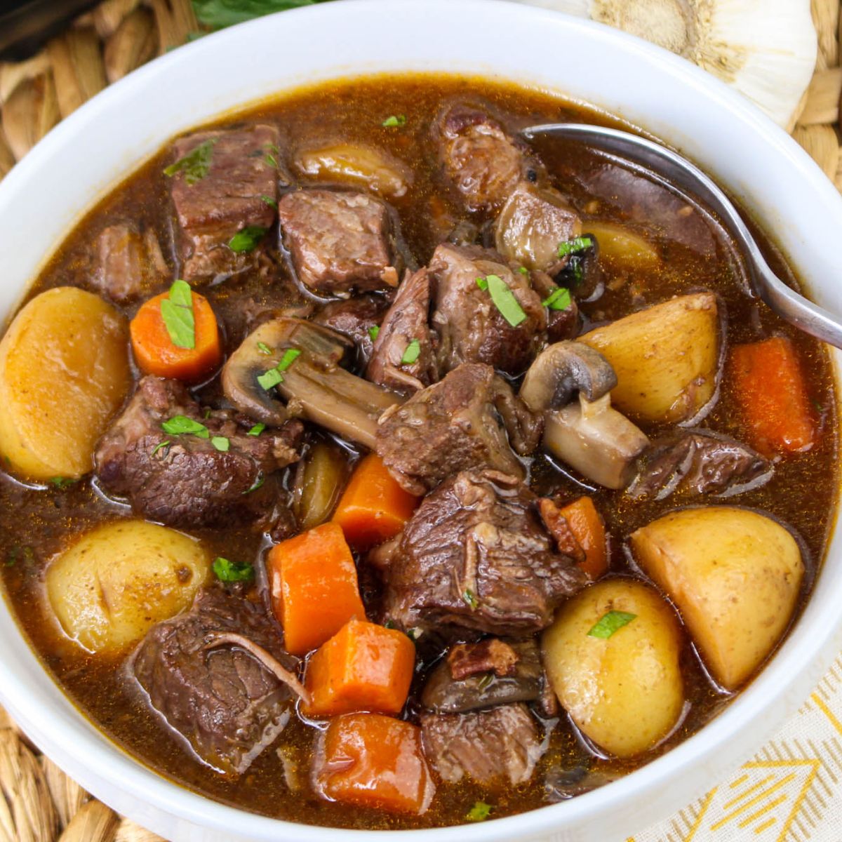 A bowl of instant pot beef Bourguignon recipe.