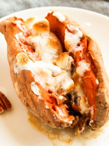 Marshmallow pecan stuffed sweet potatoes.