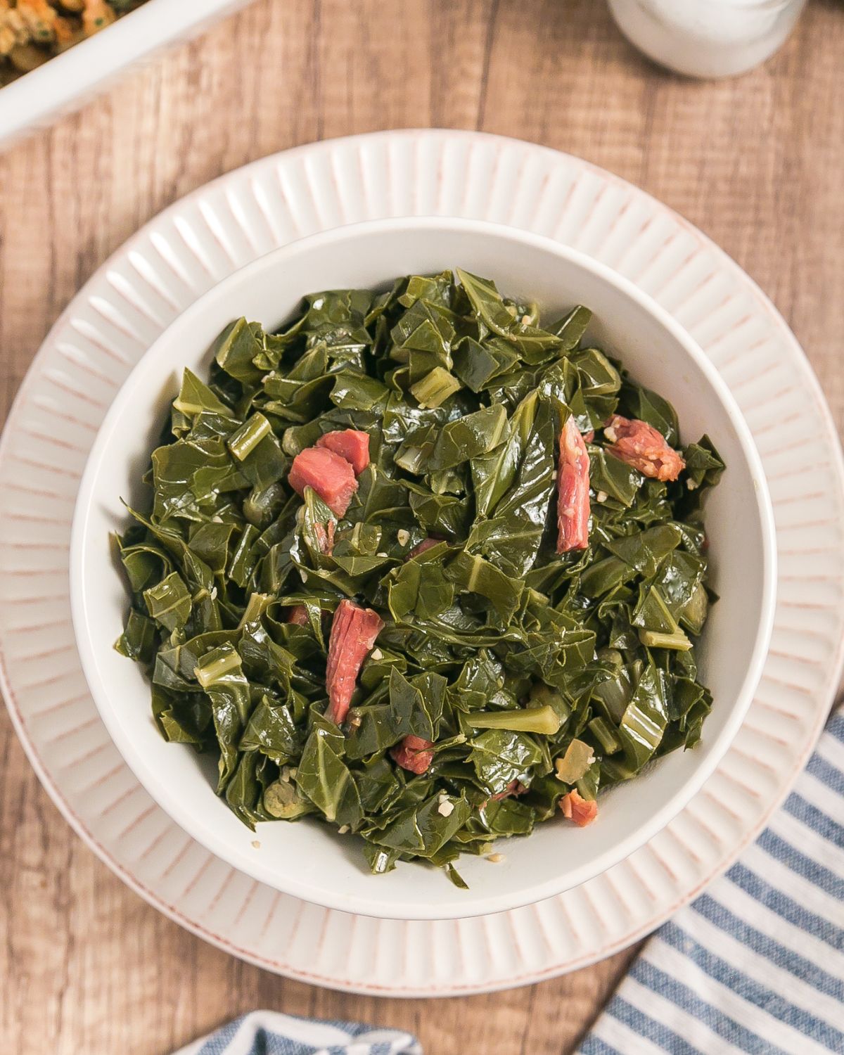 Collard greens with ham hocks side dish.