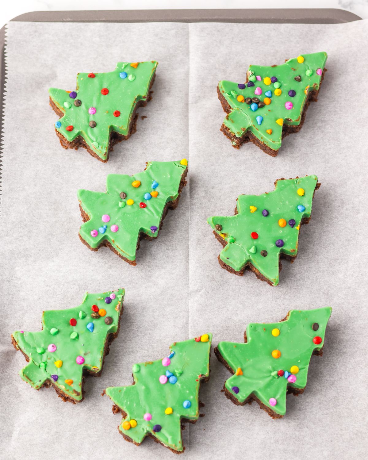 Cosmic brownies with Christmas tree shapes.
