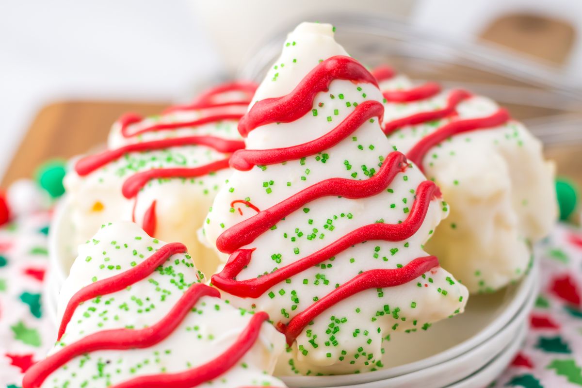 A plate with little debbie copycat christmas tree cakes.