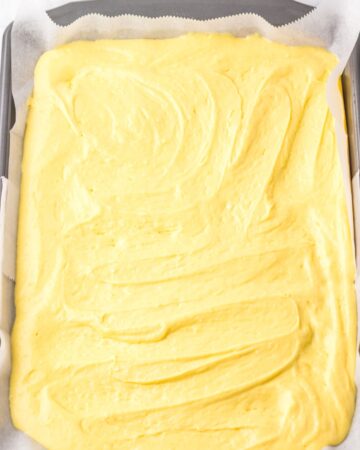 A baking pan with ingredients to make Christmas Tree cakes.