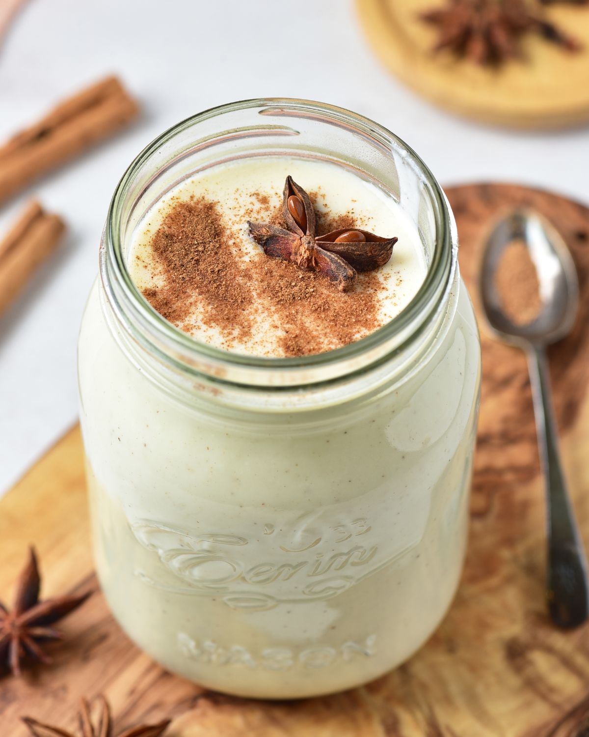 Homemade eggnog with a sprinkling of nutmeg.