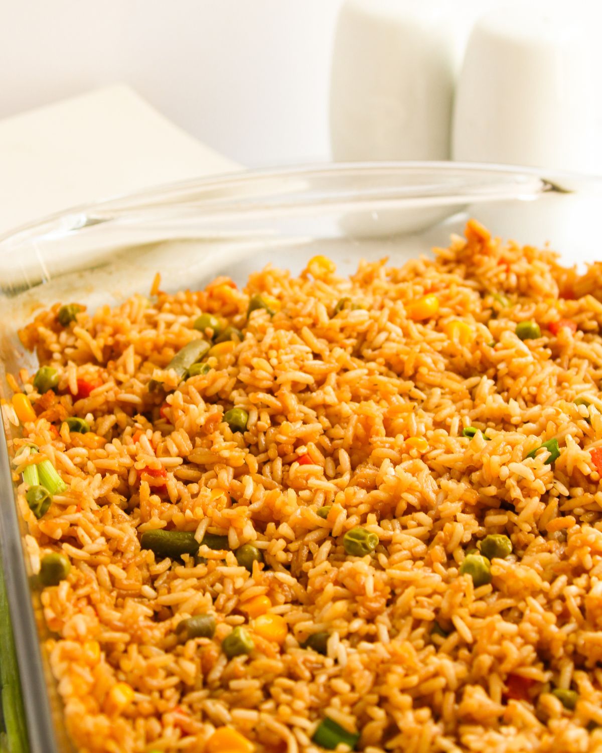 Baked fried rice in a pan on a table.