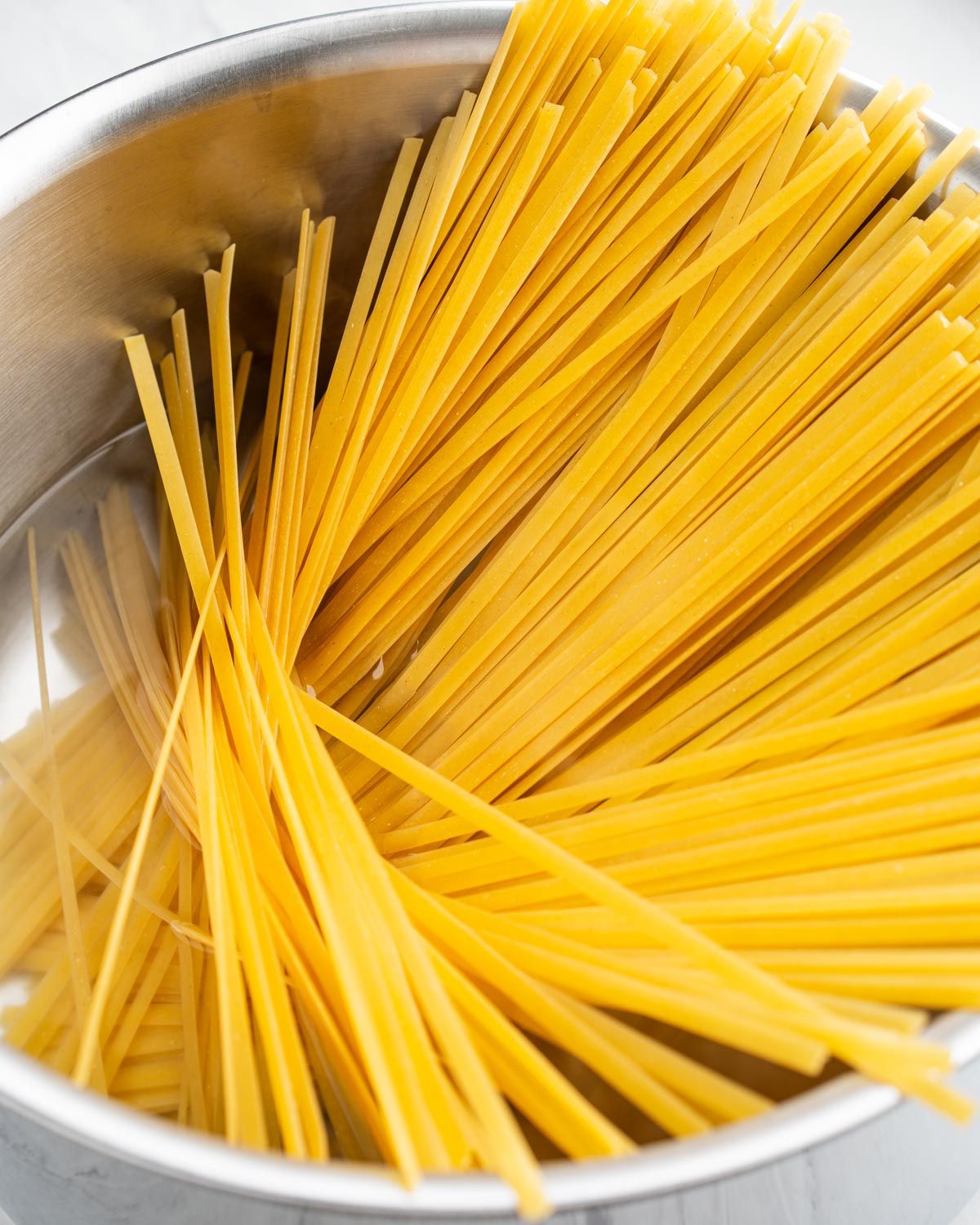 Pasta in a large stock pot to make Cajun shrimp pasta.
