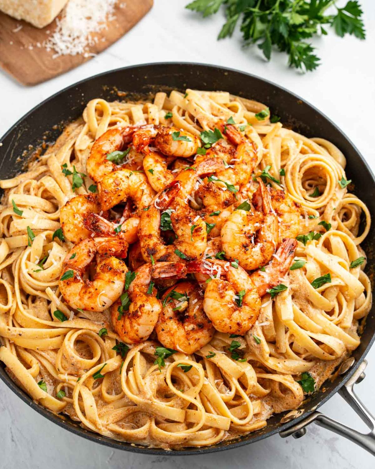 Cajun shrimp pasta in a large pan.