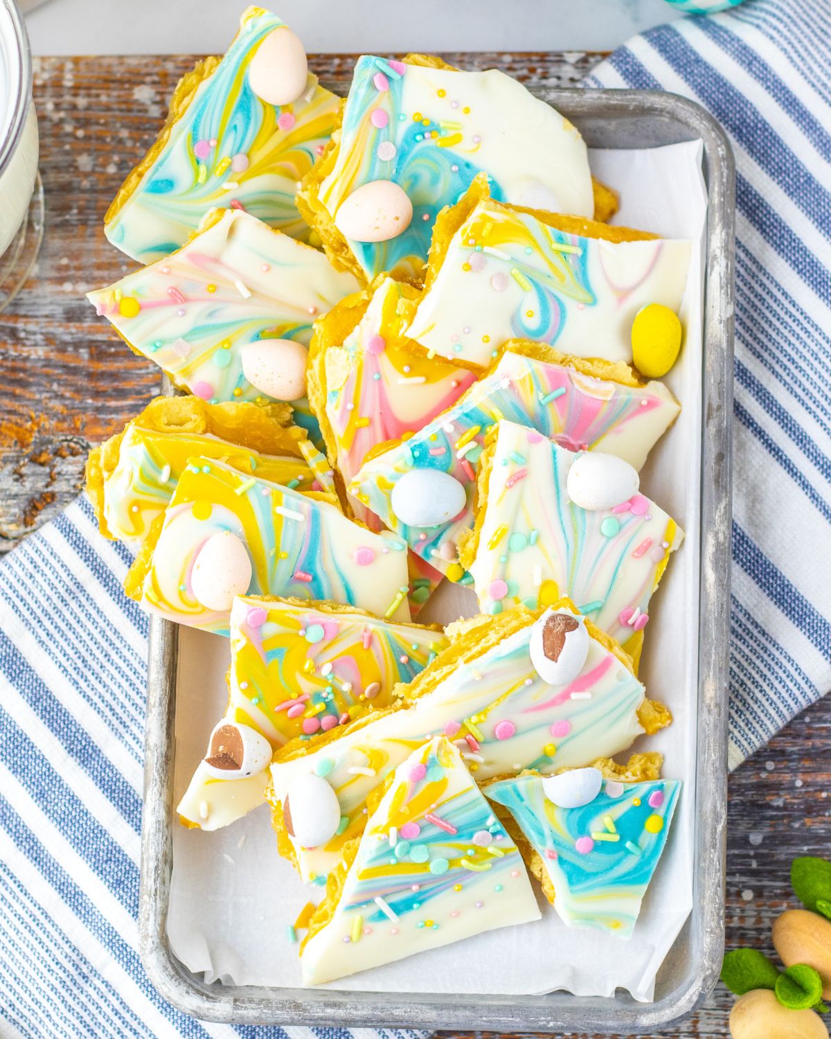 Easter saltine toffee with a pastel white chocolate topping.