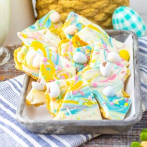 Easter Toffee Crackers with pastel candy in a silver tray.