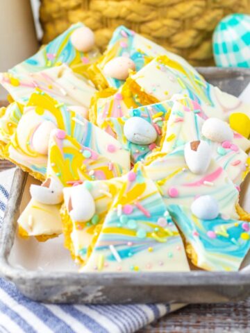 Easter Toffee Crackers with pastel candy in a silver tray.
