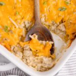 Hamburger hash brown casserole with cheesy topping.