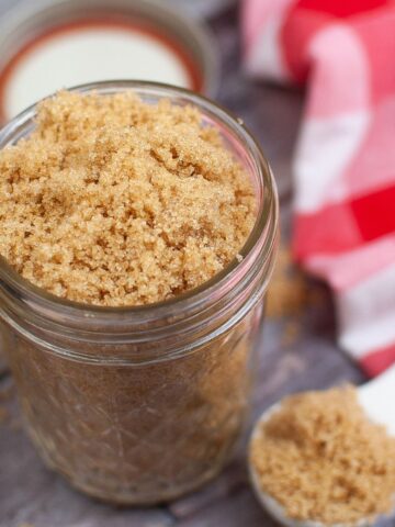 Brown sugar made with molasses in a mason jar.